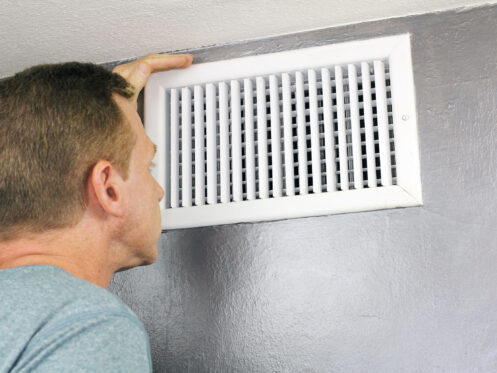 Homeowner looking into hvac vent